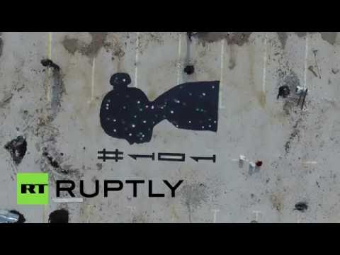 فيديو رسم جداريات لإحياء ذكرى الضحايا من الأطفال