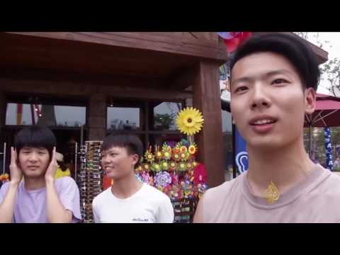 بالفيديو الصينيون يترقبون افتتاح ديزني لاند شنغهاي