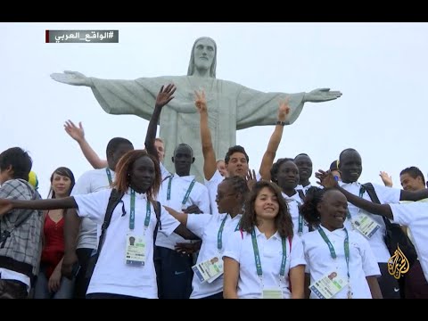 بالفيديو  فريق اللاجئين يخطف الأضواء في ريو دي جانيرو