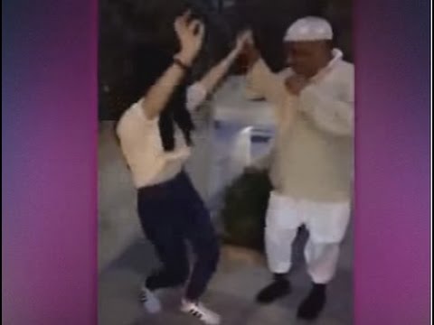 زين كرزون تؤدي رقصة الدبكة مع رجل