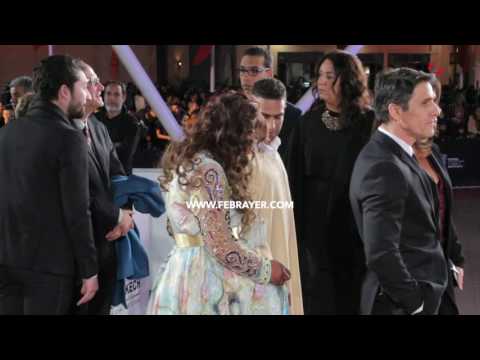 رجاء بنت الملاح مع زوجها على السجاد الأحمر