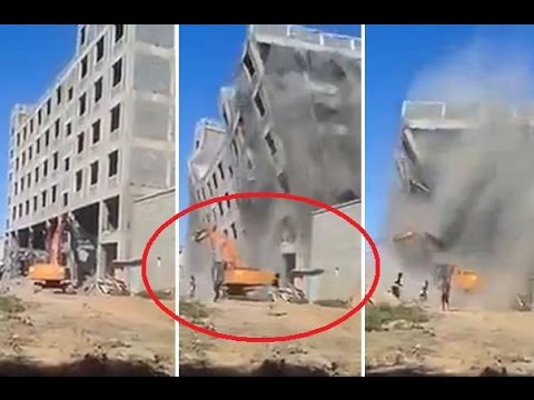لحظة انهيار مبنى متعدد الطوابق على العمال