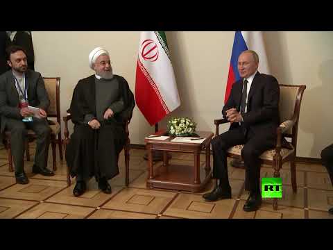 شاهد فلاديمير بوتين يلتقي حسن روحاني في عاصمة أرمينيا