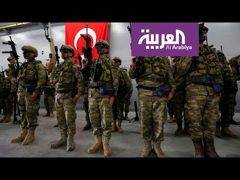 شاهد بارجتان حربيتان تبدأ إنزال جنود تركيا في العاصمة الليبية طرابلس