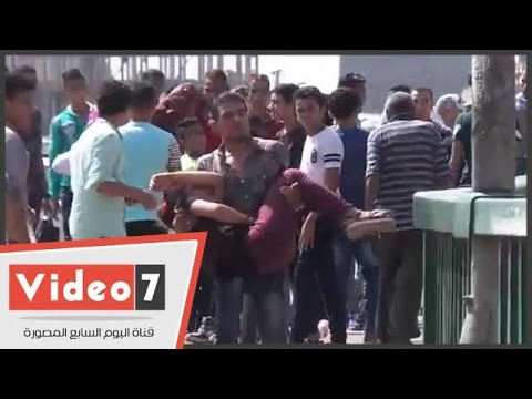 شاهد شابة تفقد الوعي عقب حفلة تحرش جماعية وسط القاهرةشاهد شابة تفقد الوعي عقب حفلة تحرش جماعية وسط القاهرة