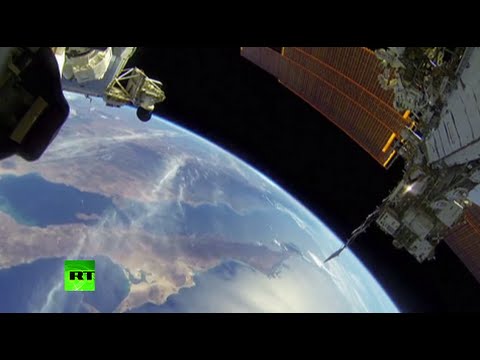 nasa astronauts conduct spacewalk outside iss