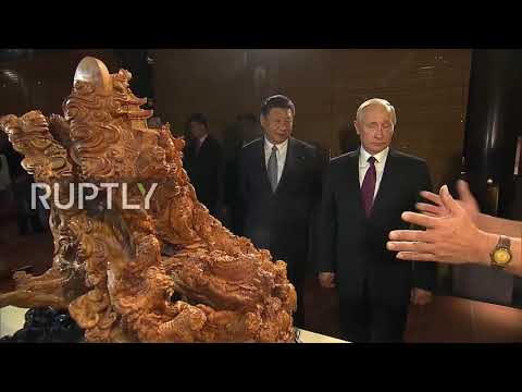 china putin and jinping witness delicate handcrafting in xiamen
