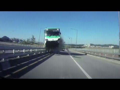 korean bus crashes into bridge