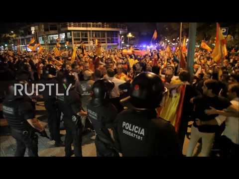 prospanish unity protesters smash doors of catalan radio station