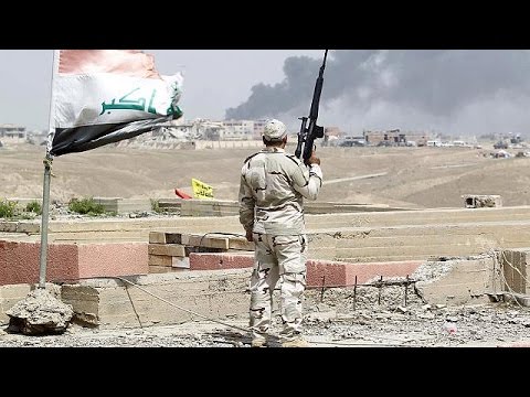 iraqi forces reclaim government headquarters