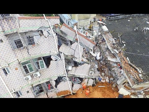 scores buried as mudslide engulfs buildings