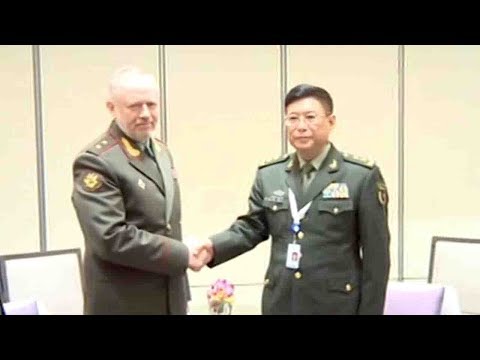 chinese russian officials laud