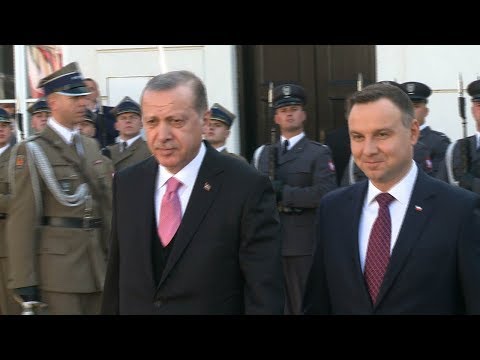 turkeys president arrives in poland for talks