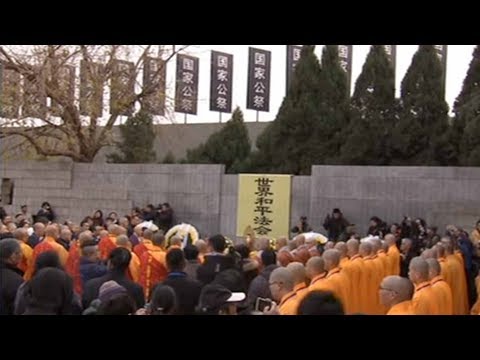 buddhist assembly for peace to remember massacre victims