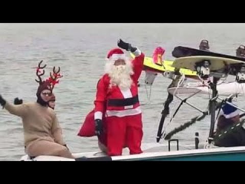 santa and the grinch waterski down