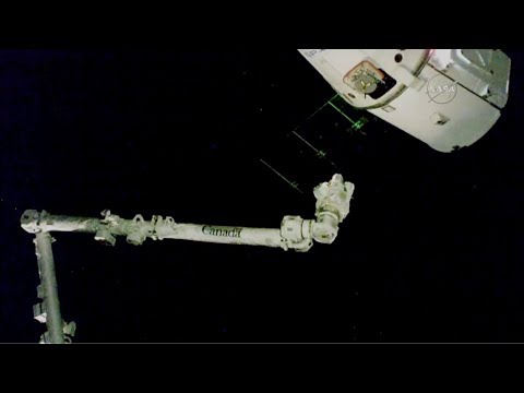 spacex dragon supply ship docks at international space station