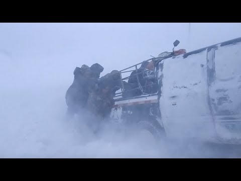 the ultimate rescue operation police trudge through snowstorm