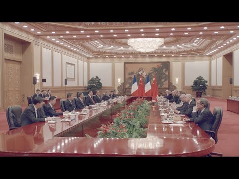 macron meets with xi as china france seal