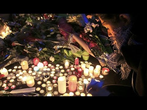 parisians united in grief hold vigils