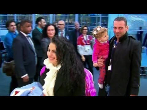 greeted syrian refugees as they entered canada