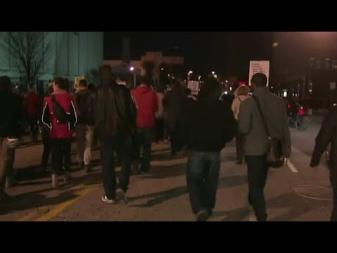 protesters march down