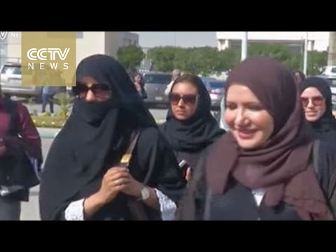 see women campaigning and voting for the first time